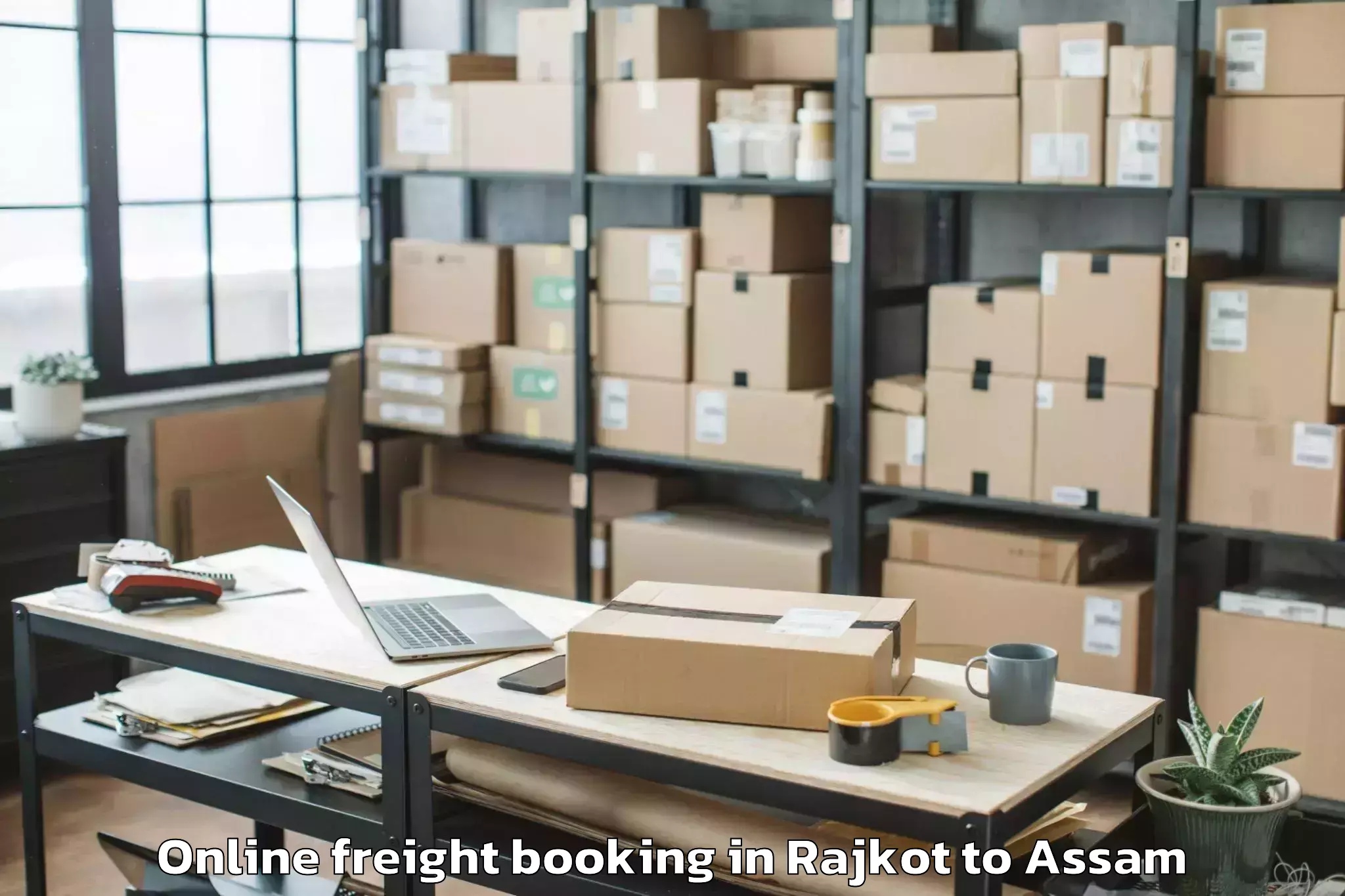 Quality Rajkot to Rajakhat Banekuchi Online Freight Booking